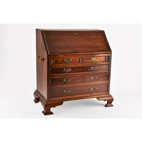 371 - An early 20th century miniature apprentice piece bureau, fall front with fitted interior over two sh... 