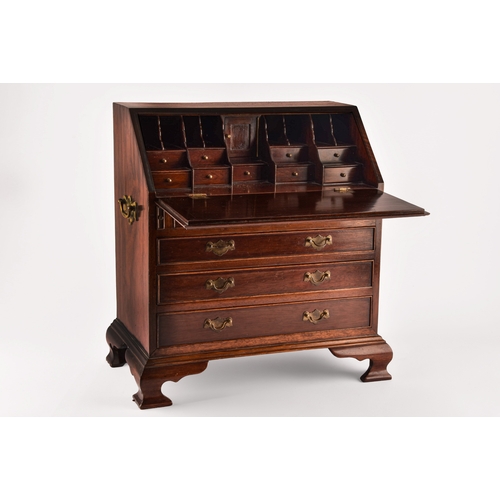 371 - An early 20th century miniature apprentice piece bureau, fall front with fitted interior over two sh... 