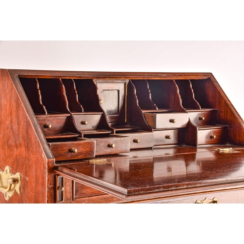 371 - An early 20th century miniature apprentice piece bureau, fall front with fitted interior over two sh... 