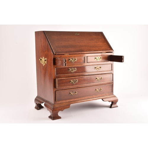 371 - An early 20th century miniature apprentice piece bureau, fall front with fitted interior over two sh... 