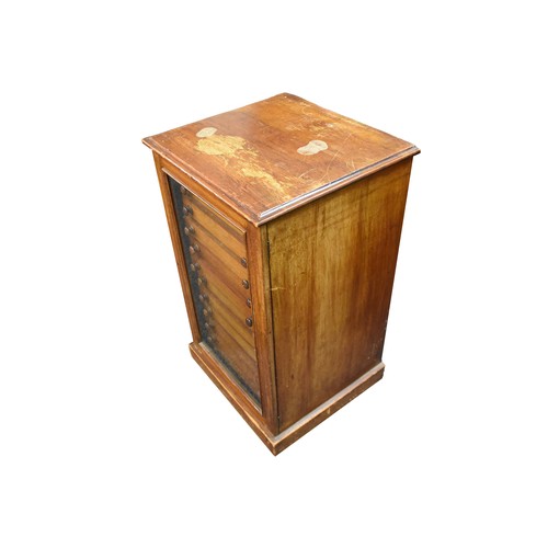 390 - A Victorian mahogany collectors or music cabinet, the single glazed door opening to reveal twelve sm... 