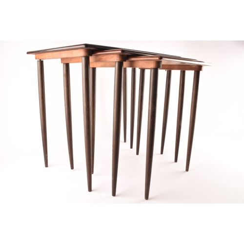 363 - A nest of three Danish rosewood occasional tables, with rounded edges and turned tapering legs, larg... 