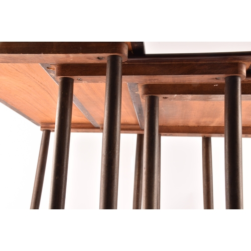 363 - A nest of three Danish rosewood occasional tables, with rounded edges and turned tapering legs, larg... 