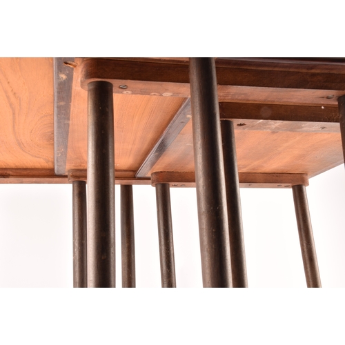 363 - A nest of three Danish rosewood occasional tables, with rounded edges and turned tapering legs, larg... 