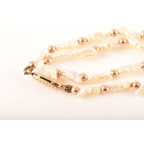 100 - A 9ct gold and pearl brooch, a 14ct pearl necklace, together with a gold plated bead and pearl chain... 