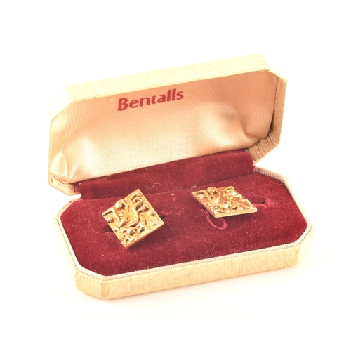 11 - A pair of 9ct gold cufflinks, in original Bentalls box, hallmarked for London 1969, rectangular plaq... 