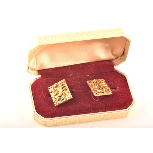 11 - A pair of 9ct gold cufflinks, in original Bentalls box, hallmarked for London 1969, rectangular plaq... 