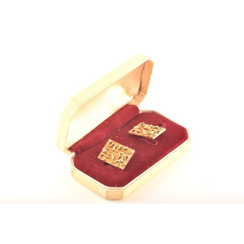 11 - A pair of 9ct gold cufflinks, in original Bentalls box, hallmarked for London 1969, rectangular plaq... 