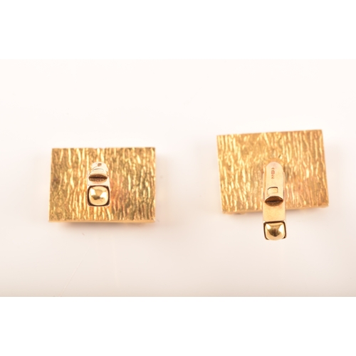 11 - A pair of 9ct gold cufflinks, in original Bentalls box, hallmarked for London 1969, rectangular plaq... 