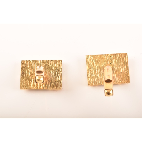 11 - A pair of 9ct gold cufflinks, in original Bentalls box, hallmarked for London 1969, rectangular plaq... 