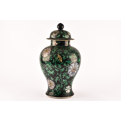 300 - A large 19th century Qing Dynasty Chinese famille noir ginger jar and cover, the lid and body decora... 