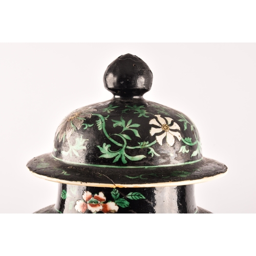 300 - A large 19th century Qing Dynasty Chinese famille noir ginger jar and cover, the lid and body decora... 