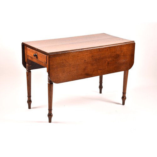 377 - An 18th century oak drop flap Pembroke table, with a pair of folding flaps, end drawer and supported... 