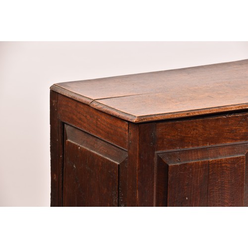 378 - An 18th century oak coffer, with hinged folding lid, triple panelled front over two short drawers, 1... 