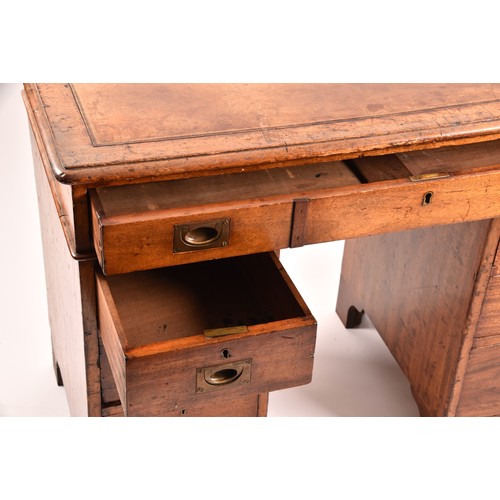 372 - A Victorian mahogany campaign pedestal desk, of small proportions, the gilt tooled leather top, over... 