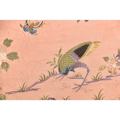 297 - A large Chinese silk work picture, decorated with a central scene of an Asiatic pheasant stood on a ... 