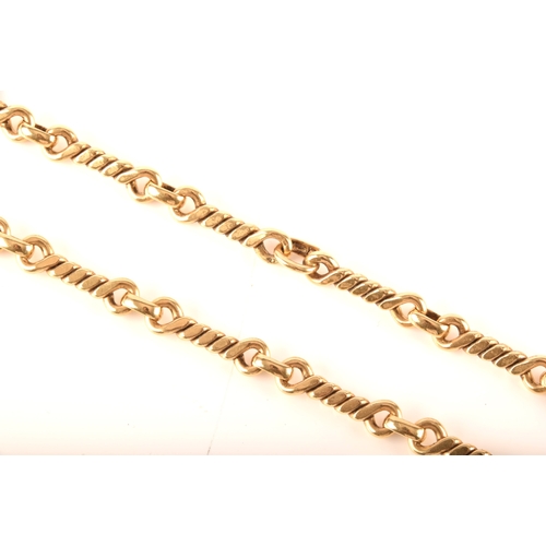 3 - A 18ct yellow gold fancy link chain, 80cm long, 99.5 grams.