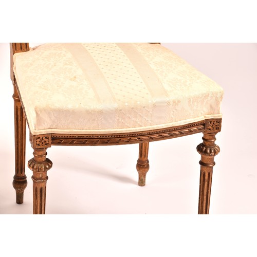 380 - A French 19th century Louis XVI style giltwood salon suite, comprising a settee, a pair of armchairs... 