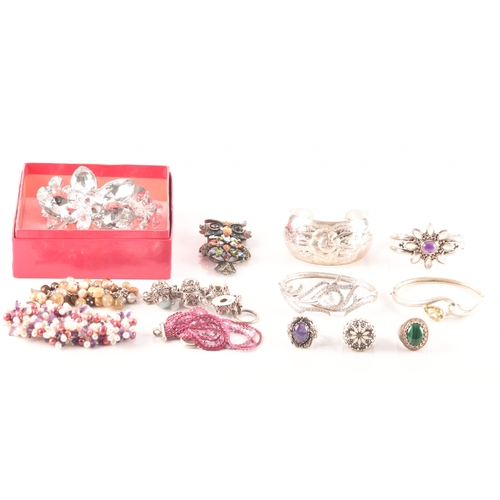 93 - A collection of costume jewellery, including various gem set silver rings, a Butler & Wilson lar... 