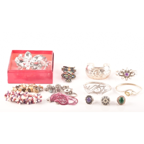 93 - A collection of costume jewellery, including various gem set silver rings, a Butler & Wilson lar... 