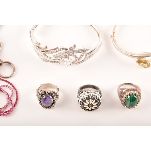 93 - A collection of costume jewellery, including various gem set silver rings, a Butler & Wilson lar... 