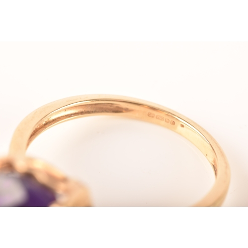 32 - A large 18ct yellow gold amethyst solitaire ring, set to centre with a oval checkerboard cut amethys... 