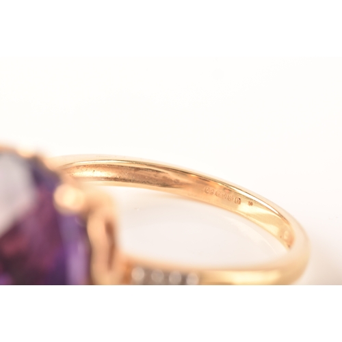 32 - A large 18ct yellow gold amethyst solitaire ring, set to centre with a oval checkerboard cut amethys... 