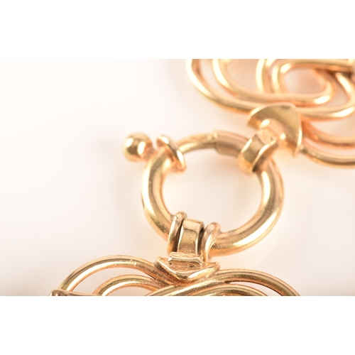 17 - A 9ct yellow gold detailed fancy link bracelet with a spring ring clasp, 20cm long, together with a ... 