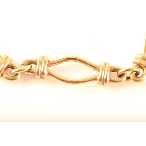 25 - An 18ct yellow gold fancy link bracelet, 19cm long.