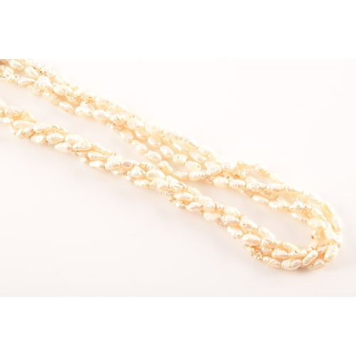 12 - A twisted four strand freshwater pearl necklace, with 14ct yellow gold clasp, 79cm long.