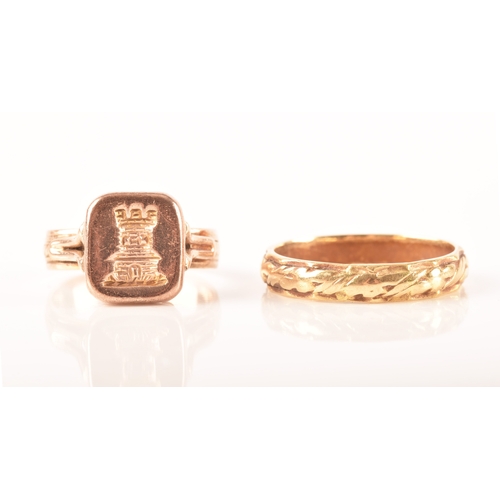 68 - A yellow metal wedding ring with engraved pattern, size N, together with a rose metal signet ring fe... 