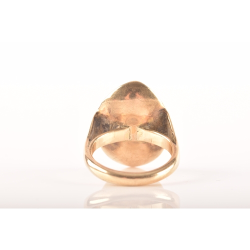 91 - A 9ct yellow gold dress ring with a concave oval design, set to centre with a opal measuring approxi... 