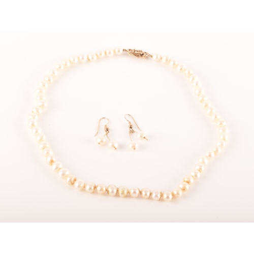 97 - A pair of 9ct yellow gold pearl drop earrings, together with a single strand of freshwater pearls st... 