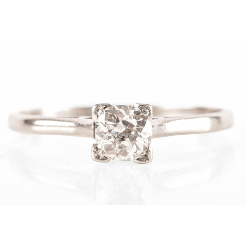 84 - A platinum diamond solitaire ring, set to centre with a round old cut diamond with an approximate we... 