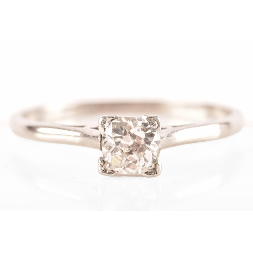 84 - A platinum diamond solitaire ring, set to centre with a round old cut diamond with an approximate we... 