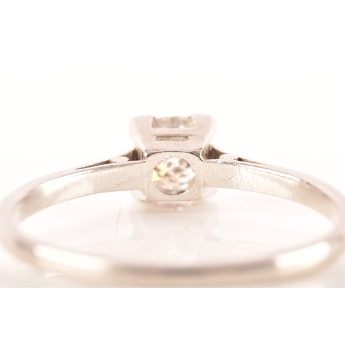 84 - A platinum diamond solitaire ring, set to centre with a round old cut diamond with an approximate we... 