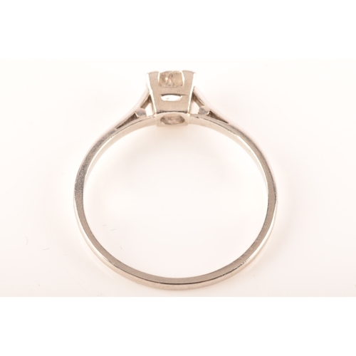 84 - A platinum diamond solitaire ring, set to centre with a round old cut diamond with an approximate we... 