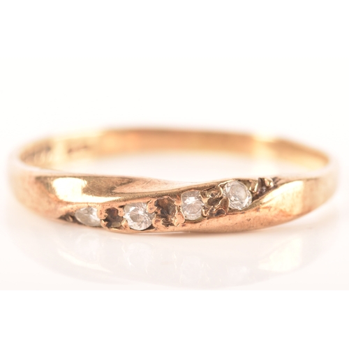 86 - Three 9ct yellow gold rings, including a 9ct gold and paste wishbone ring, a 9ct gold and diagonally... 