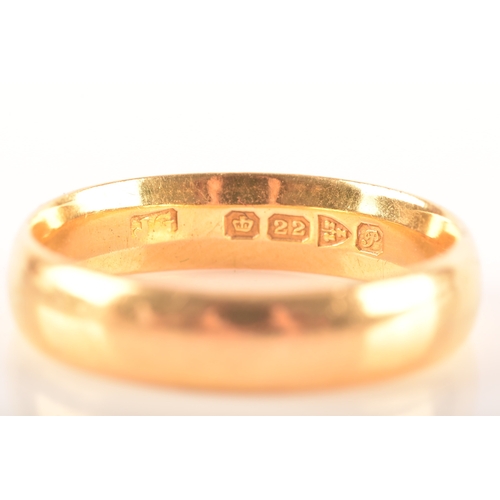 2 - A 22ct gold wedding band, hallmarked for Chester 1915, 4.5mm wide, size O 1/2.