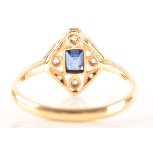 79 - An early 20th century 18ct gold sapphire cluster and diamond ring, set to centre with a rectangular ... 