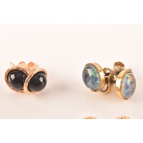 39 - A group of 9ct gold earrings set with various gemstones, together with a selection of yellow metal a... 