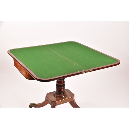 374 - An unusual Regency mahogany and elm foldover card table, the rosewood crossbanded top opening to rev... 