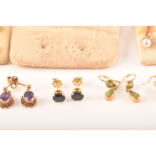 41 - A collection of 9ct yellow gold earrings, set with various gemstones, together with an array of yell... 