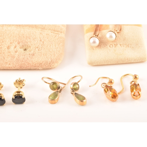 41 - A collection of 9ct yellow gold earrings, set with various gemstones, together with an array of yell... 