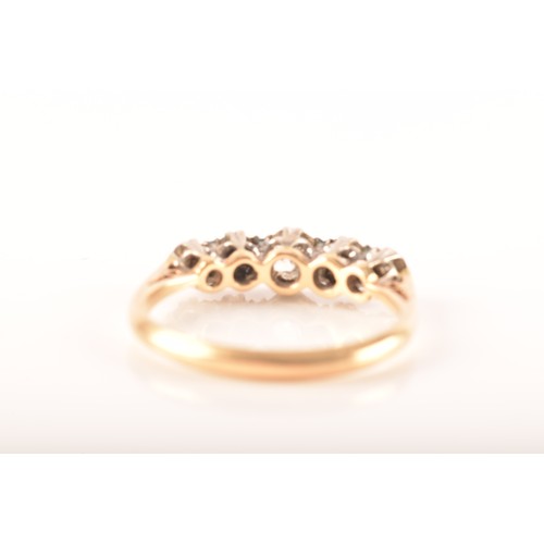 59 - A Victorian 18ct gold and diamond five stone ring, set with five graduating round old cut diamonds, ... 