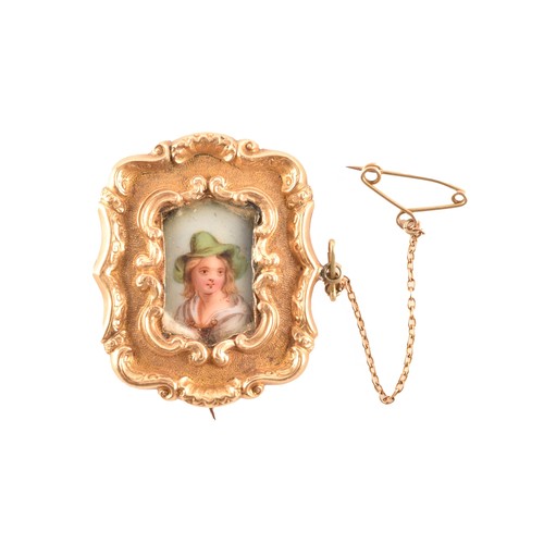 88 - A 19th century brooch, featuring a miniature enamel portrait of a lady surrounded by an ornate yello... 