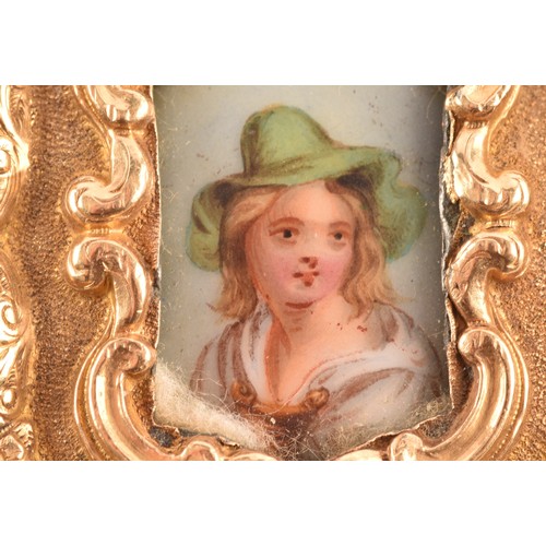 88 - A 19th century brooch, featuring a miniature enamel portrait of a lady surrounded by an ornate yello... 