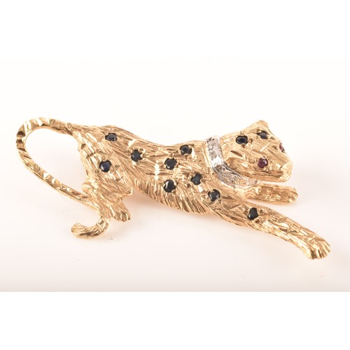 60 - A 9ct gold leaping leopard brooch, together with a pair of 18ct gold stud earrings. (2)