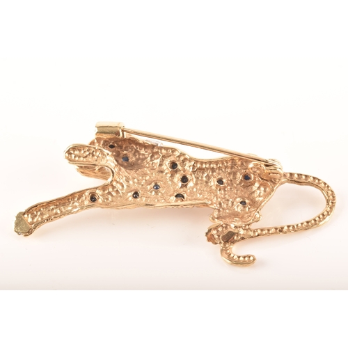 60 - A 9ct gold leaping leopard brooch, together with a pair of 18ct gold stud earrings. (2)