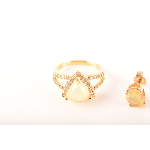 107 - A 9ct yellow gold stud earrings, each set with a oval opal, together with a 9ct yellow gold pendant ... 